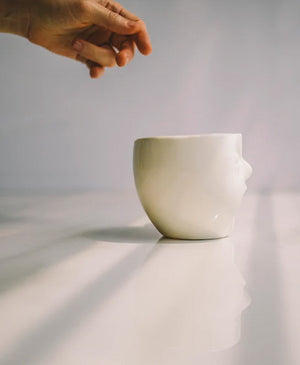 Porcelain Mug, Yawning Face