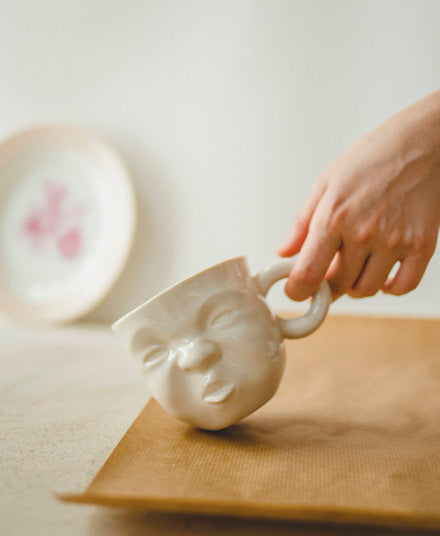 Porcelain Face Mugs